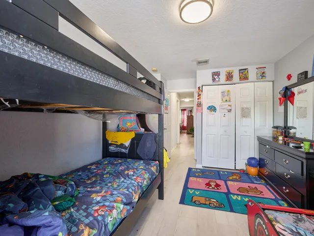 a view of swimming pool with a patio