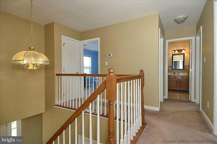 307 Stuart Court Berryville, VA 22611 - Photo 22 of 29 Upper Hallway open to Foyer