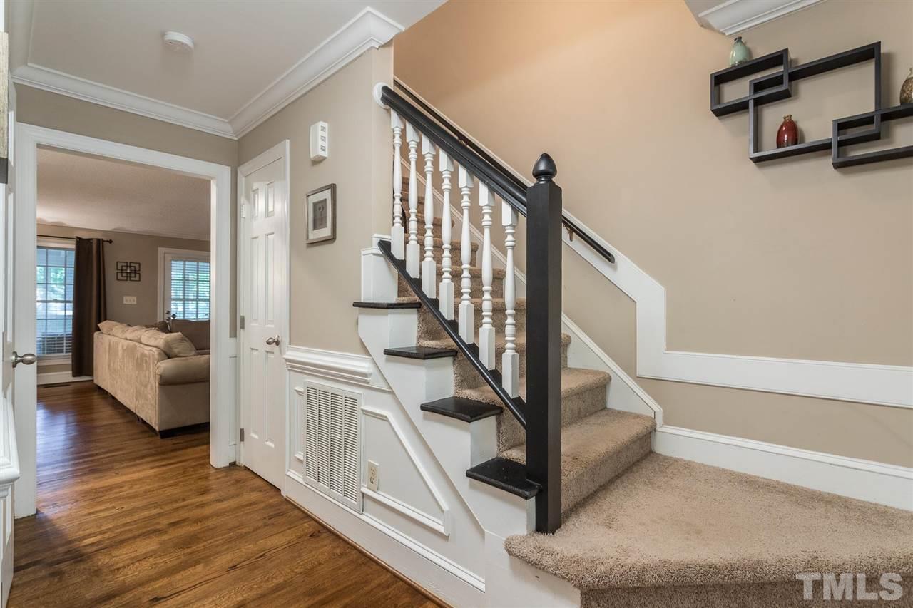 1025 Sawmill Road Raleigh, NC 27615 - Photo 2 of 25 a view of entryway and hall with wooden floor