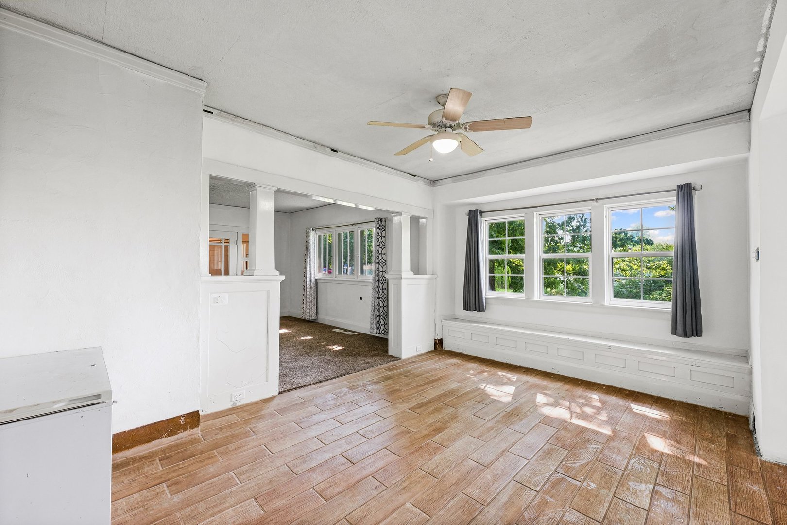 3609 Artesian Avenue Armstrong, IL 61812 - Photo 13 of 32 a view of an empty room with a window and wooden floor