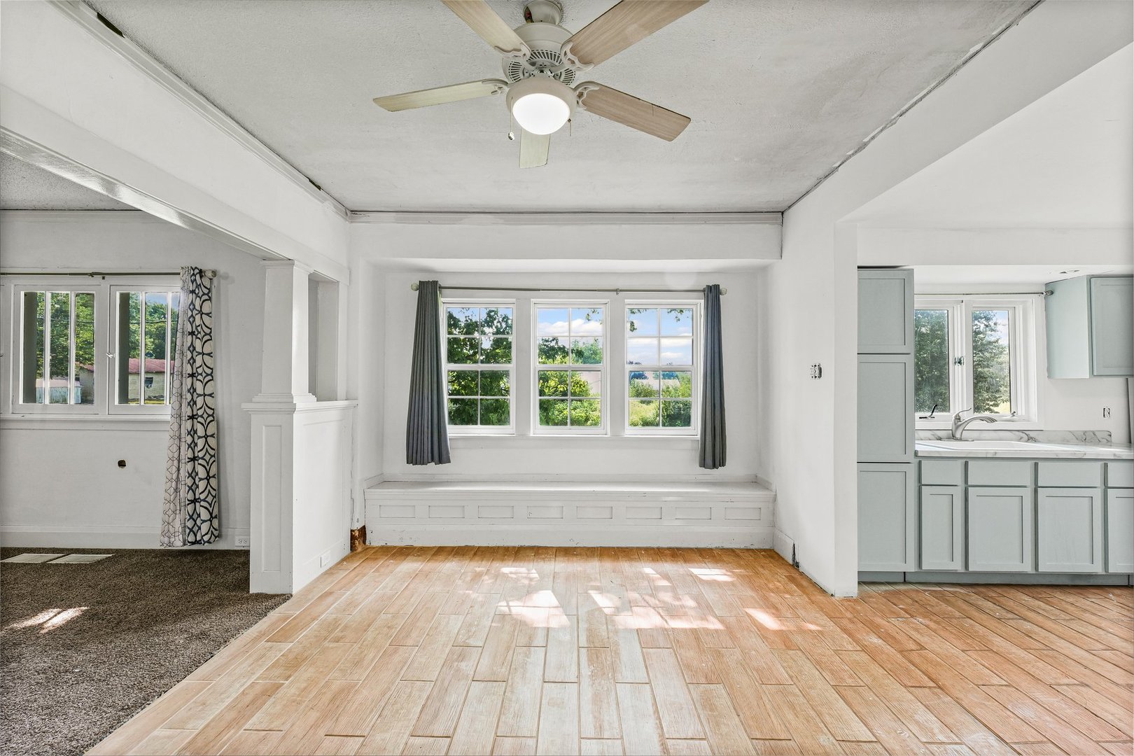 3609 Artesian Avenue Armstrong, IL 61812 - Photo 16 of 32 a view of an empty room with window and wooden floor