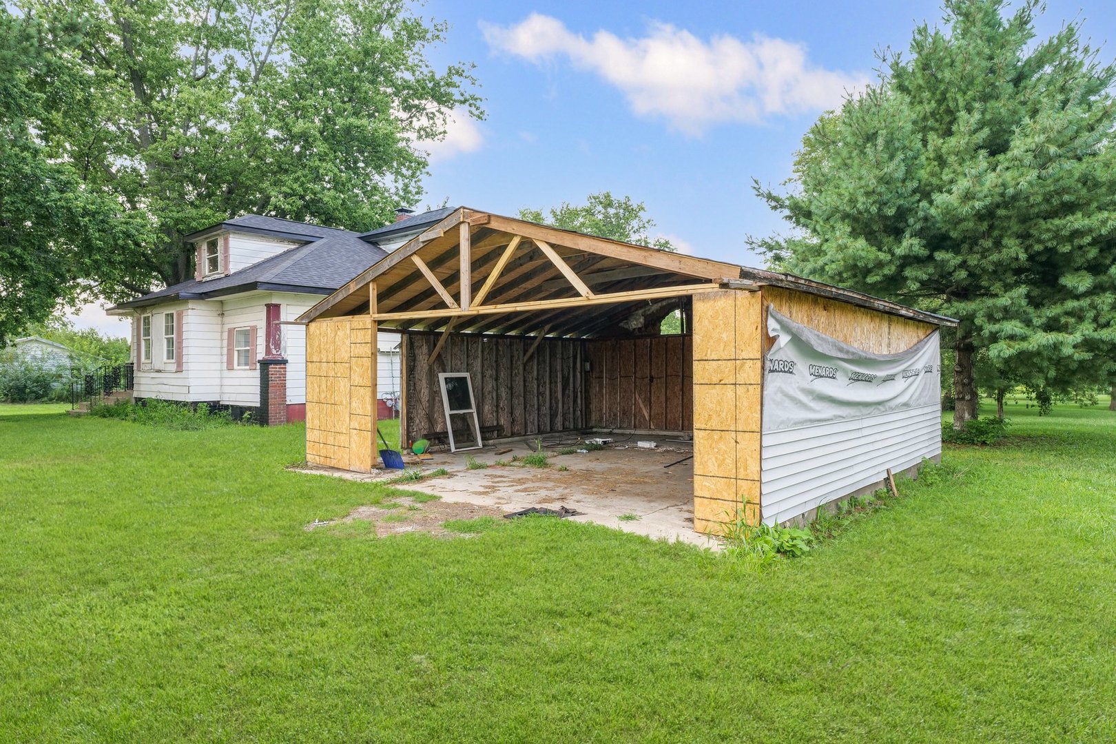 3609 Artesian Avenue Armstrong, IL 61812 - Photo 21 of 32 a front view of a house with a yard