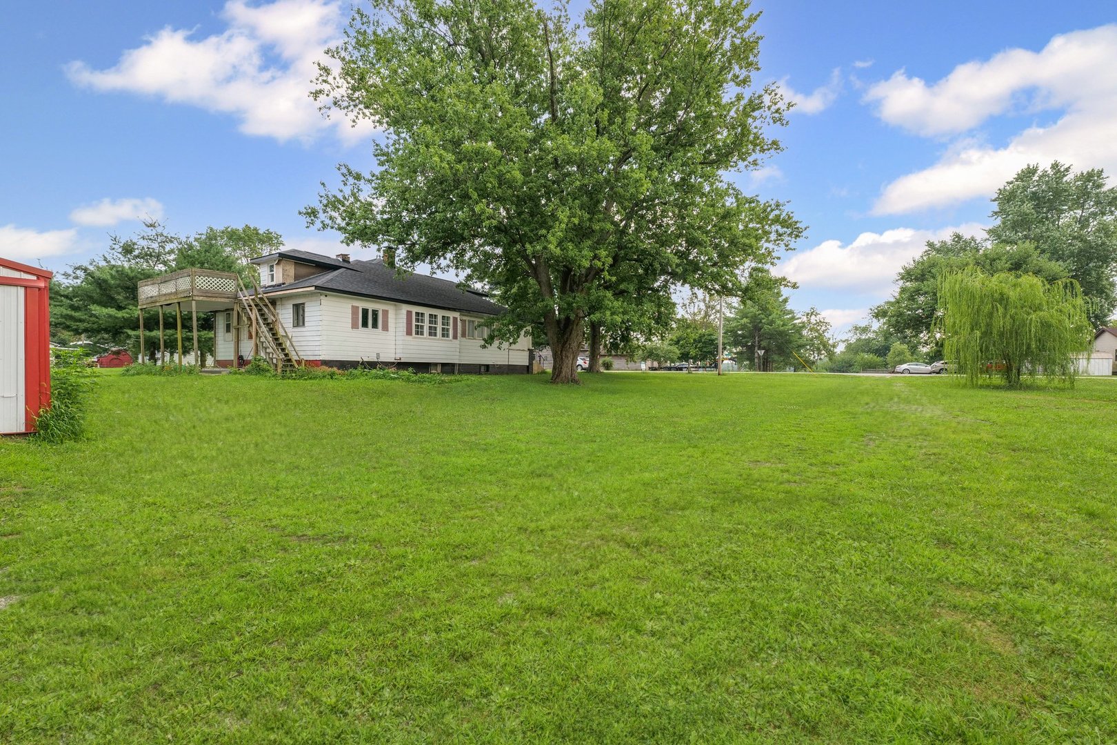 3609 Artesian Avenue Armstrong, IL 61812 - Photo 25 of 32 a view of a house with a big yard