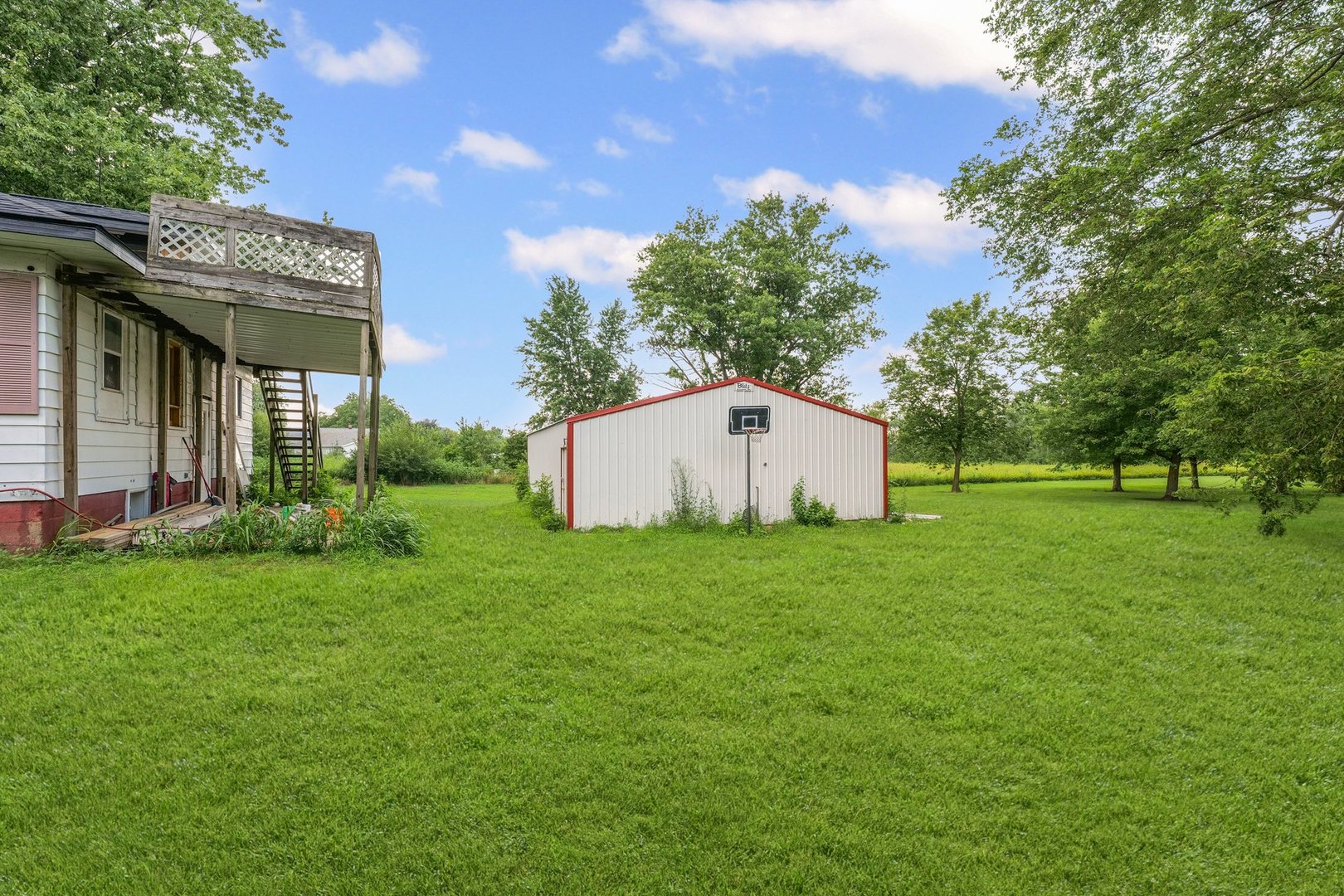 3609 Artesian Avenue Armstrong, IL 61812 - Photo 27 of 32 a view of a house with backyard and garden