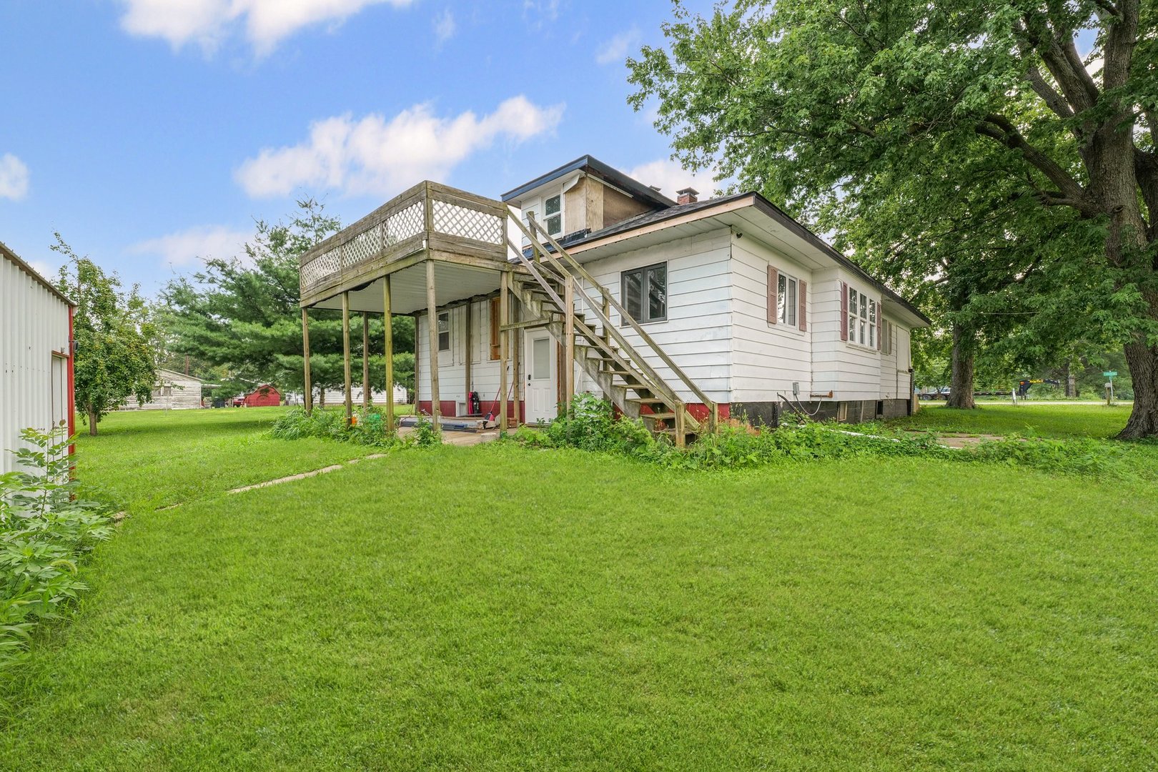 3609 Artesian Avenue Armstrong, IL 61812 - Photo 30 of 32 a front view of house with yard and green space