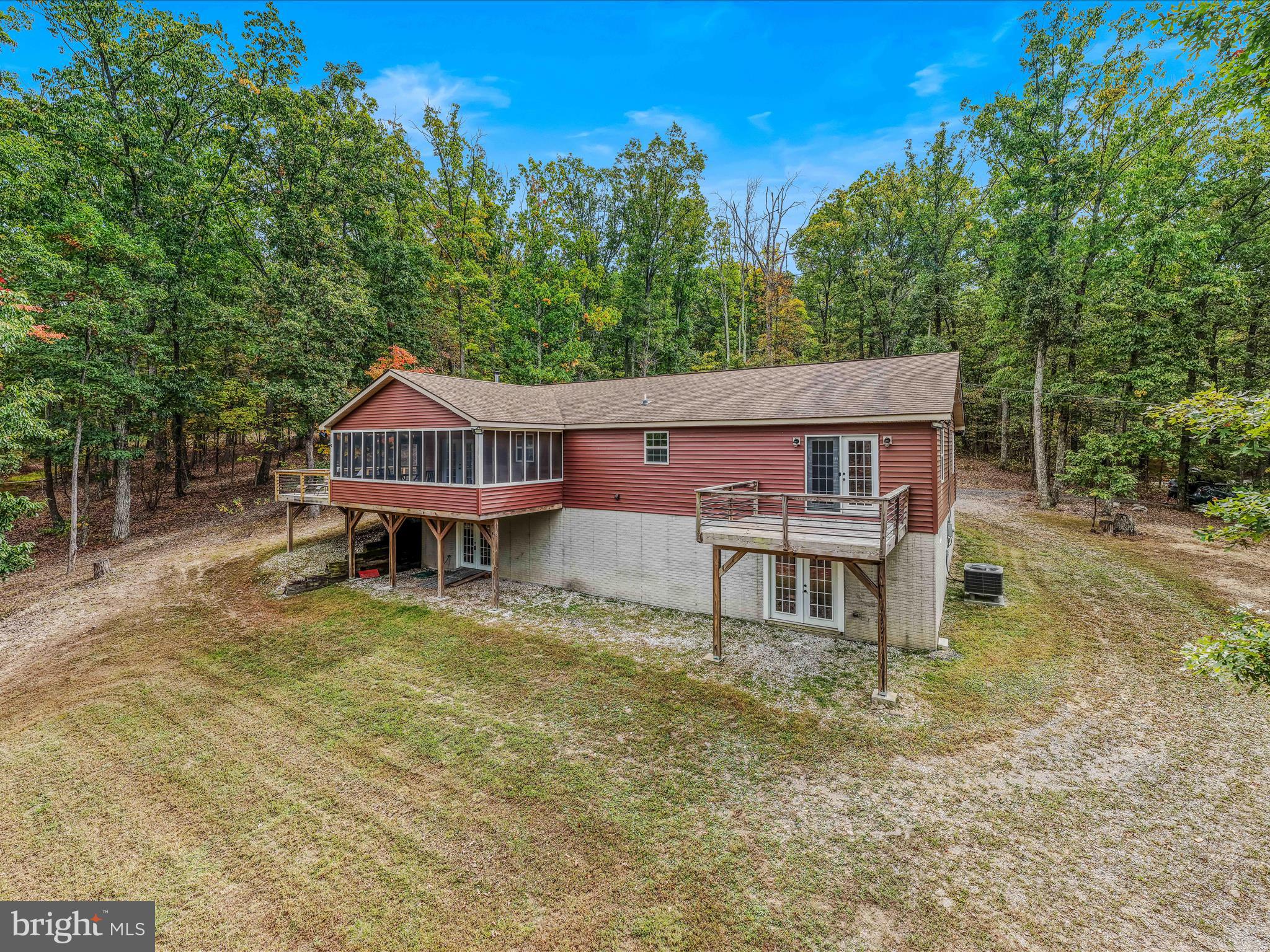 front view of a house with a small yard