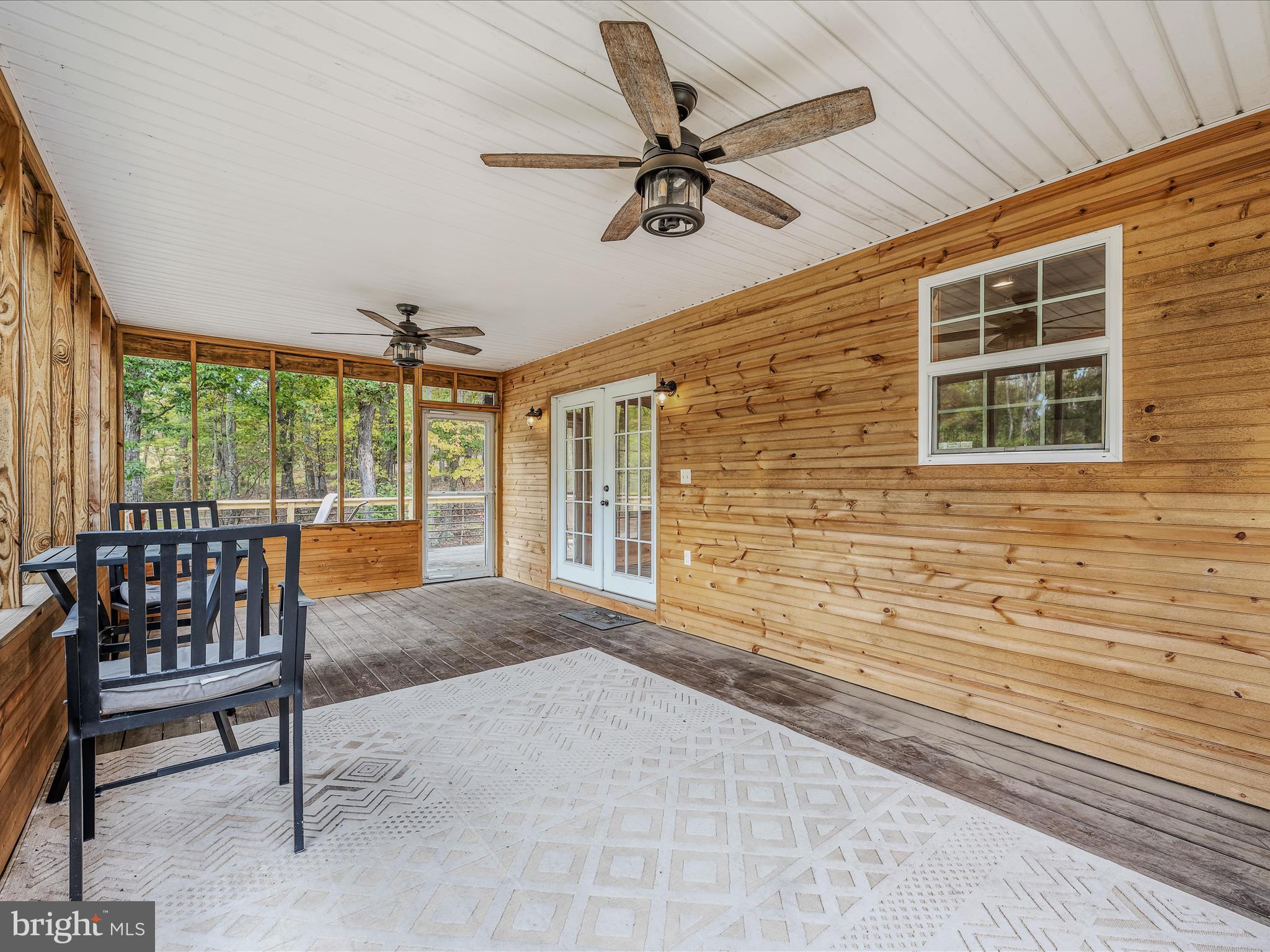 79 Whiskey Still Road Berkeley Springs, WV 25411 - Photo 35 of 59 a view of an outdoor space with porch