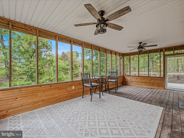 a view of a backyard of the house