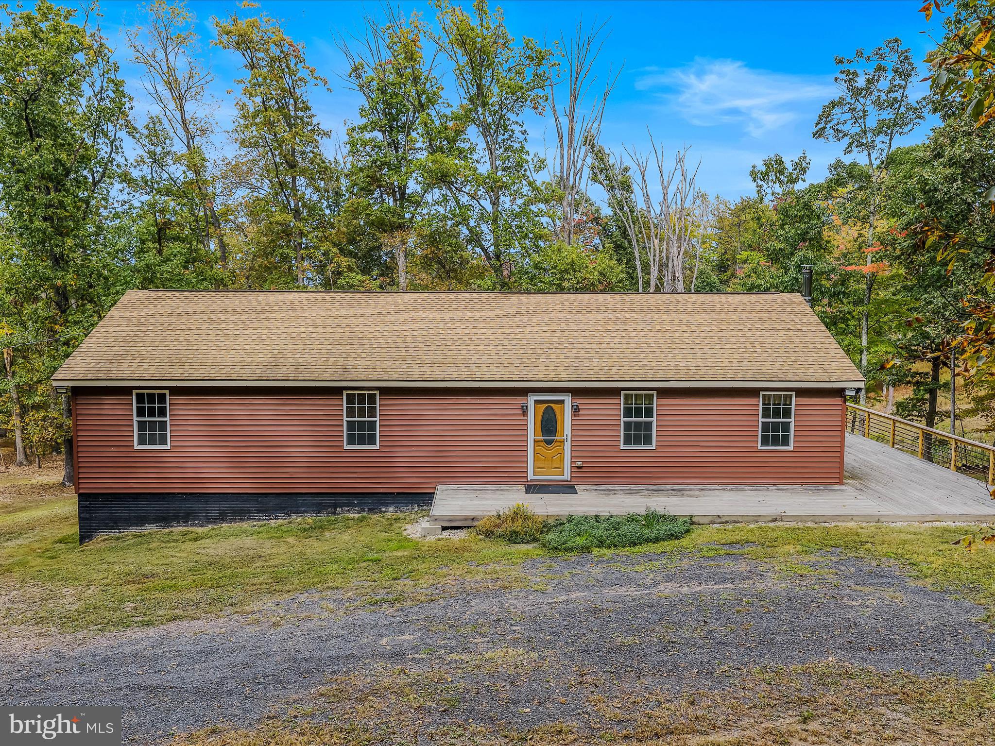 79 Whiskey Still Road Berkeley Springs, WV 25411 - Photo 4 of 59 front view of a house with a yard