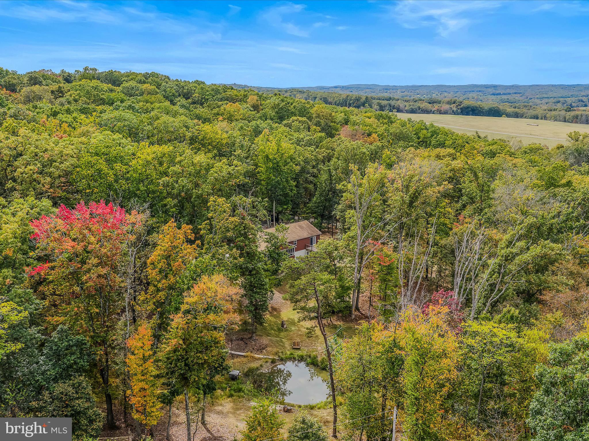 79 Whiskey Still Road Berkeley Springs, WV 25411 - Photo 46 of 59 a view of a yard with an outdoor space