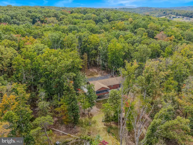 an aerial view of beach and city