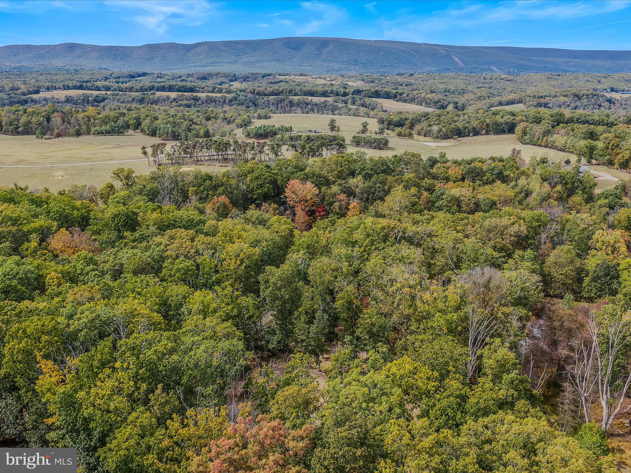 79 Whiskey Still Road Berkeley Springs, WV 25411 - Photo 52 of 59 a view of city and mountain