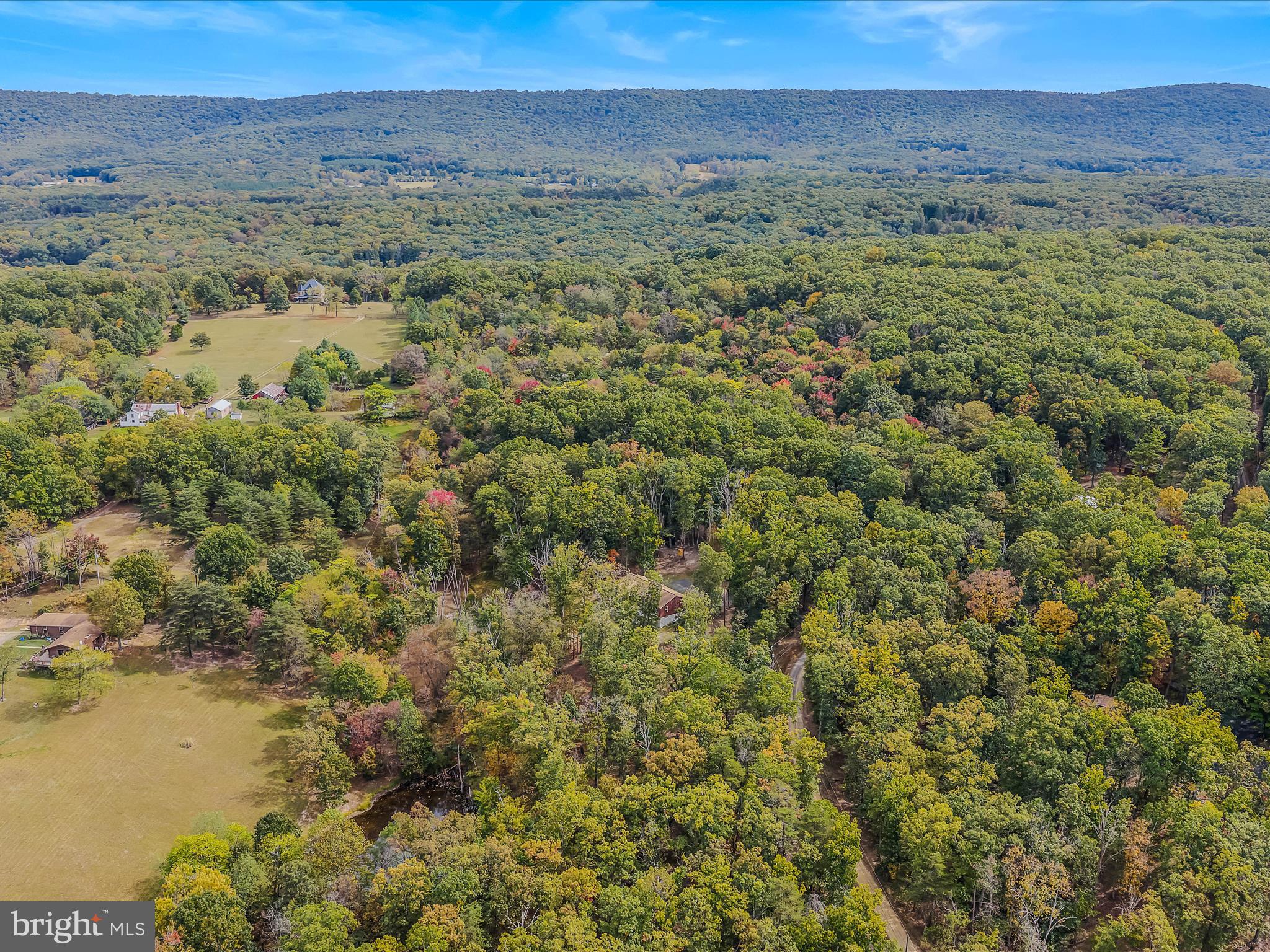 79 Whiskey Still Road Berkeley Springs, WV 25411 - Photo 56 of 59 a view of a field with an ocean