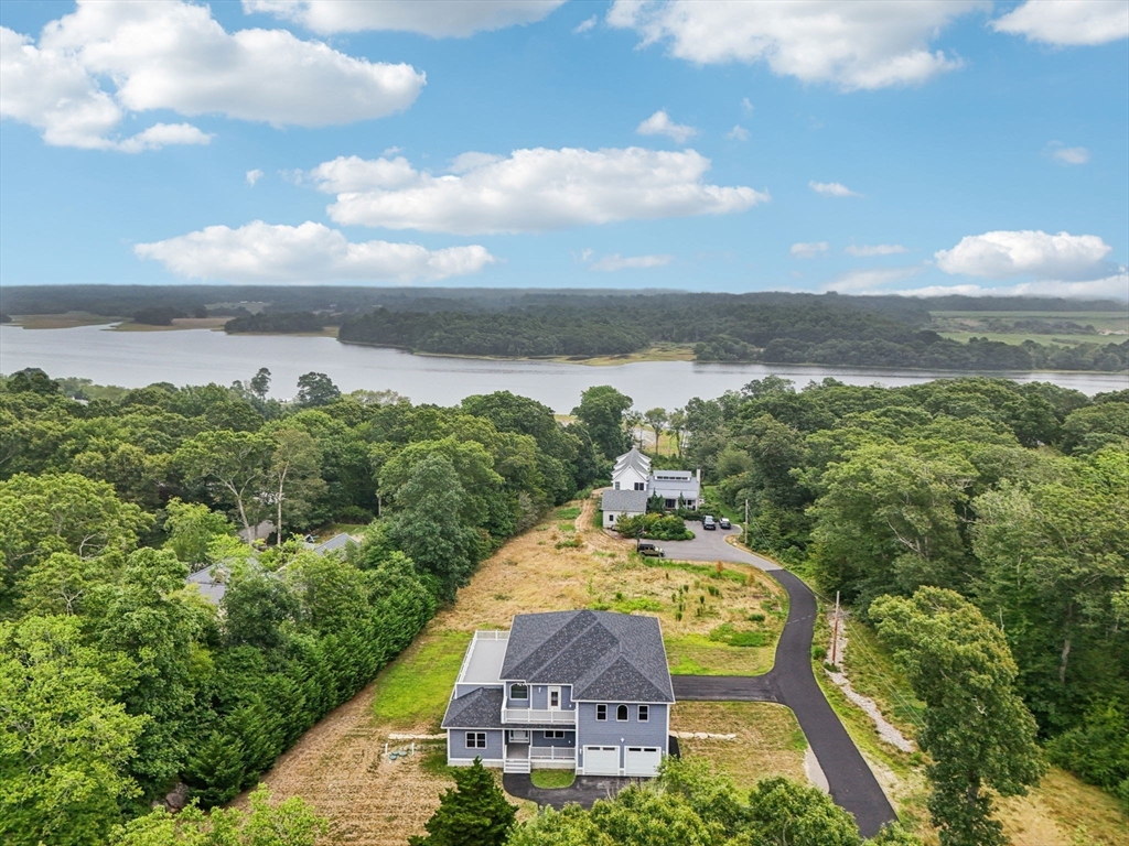 920 Drift Road Westport, MA 02790 - Photo 13 of 41 an aerial view of a house with backyard swimming pool and mountains