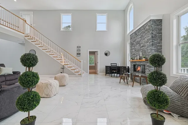 a view of hall way with furniture