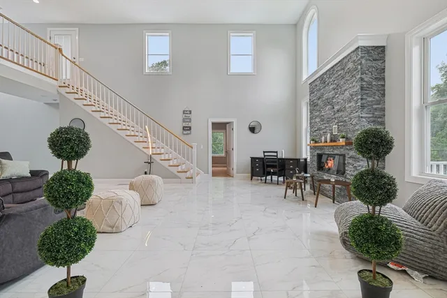 a view of hall way with furniture