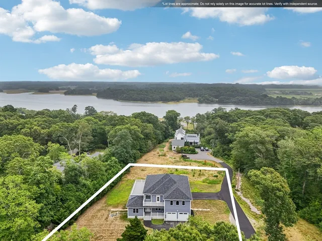 an aerial view of a house with a garden