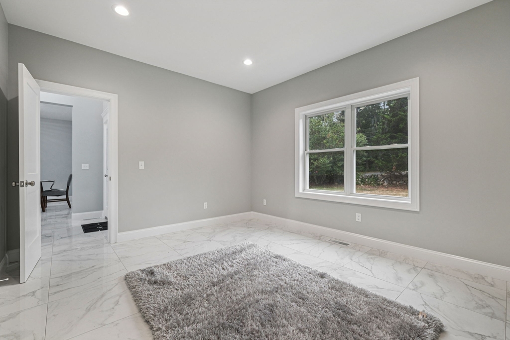 920 Drift Road Westport, MA 02790 - Photo 21 of 41 a view of an empty room with a window