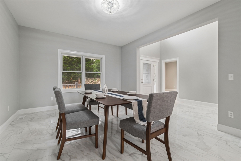 920 Drift Road Westport, MA 02790 - Photo 23 of 41 a view of a dining room with furniture and window