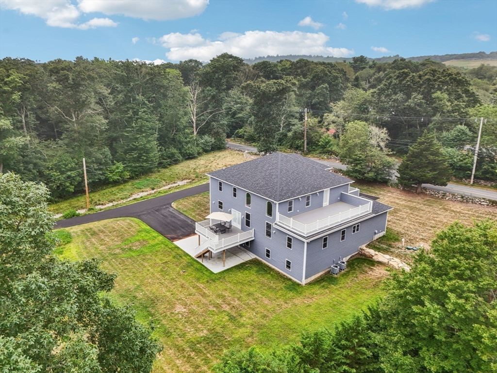 920 Drift Road Westport, MA 02790 - Photo 3 of 41 a aerial view of a house with a big yard