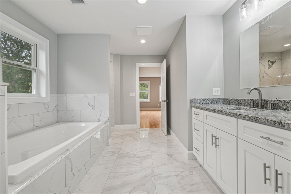 920 Drift Road Westport, MA 02790 - Photo 33 of 41 a spacious bathroom with sink shower and bathtub