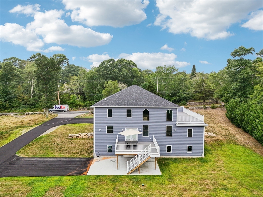 920 Drift Road Westport, MA 02790 - Photo 10 of 41 a view of a house with a yard