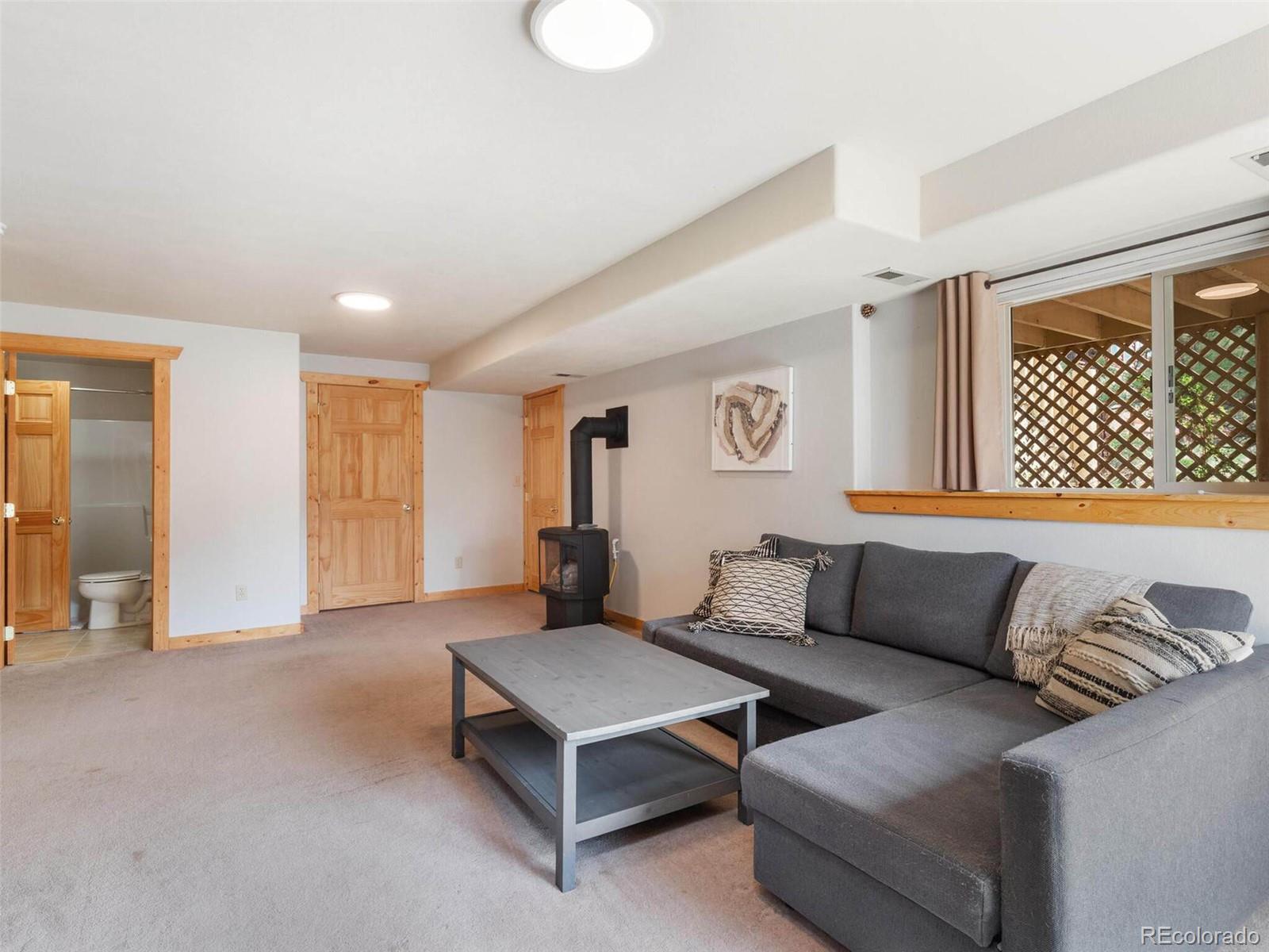 603 Old State Road Bailey, CO 80421 - Photo 31 of 40 a living room with furniture and a window