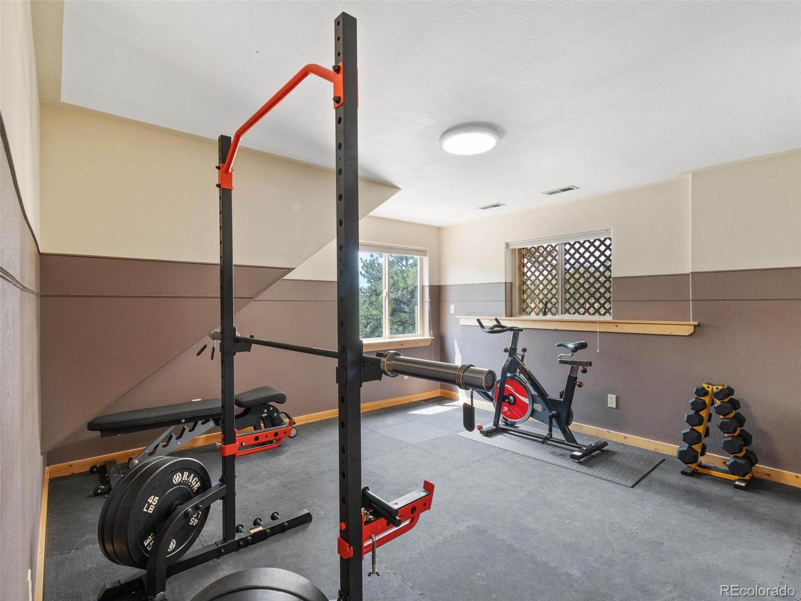 603 Old State Road Bailey, CO 80421 - Photo 32 of 40 a view of a room with gym equipment