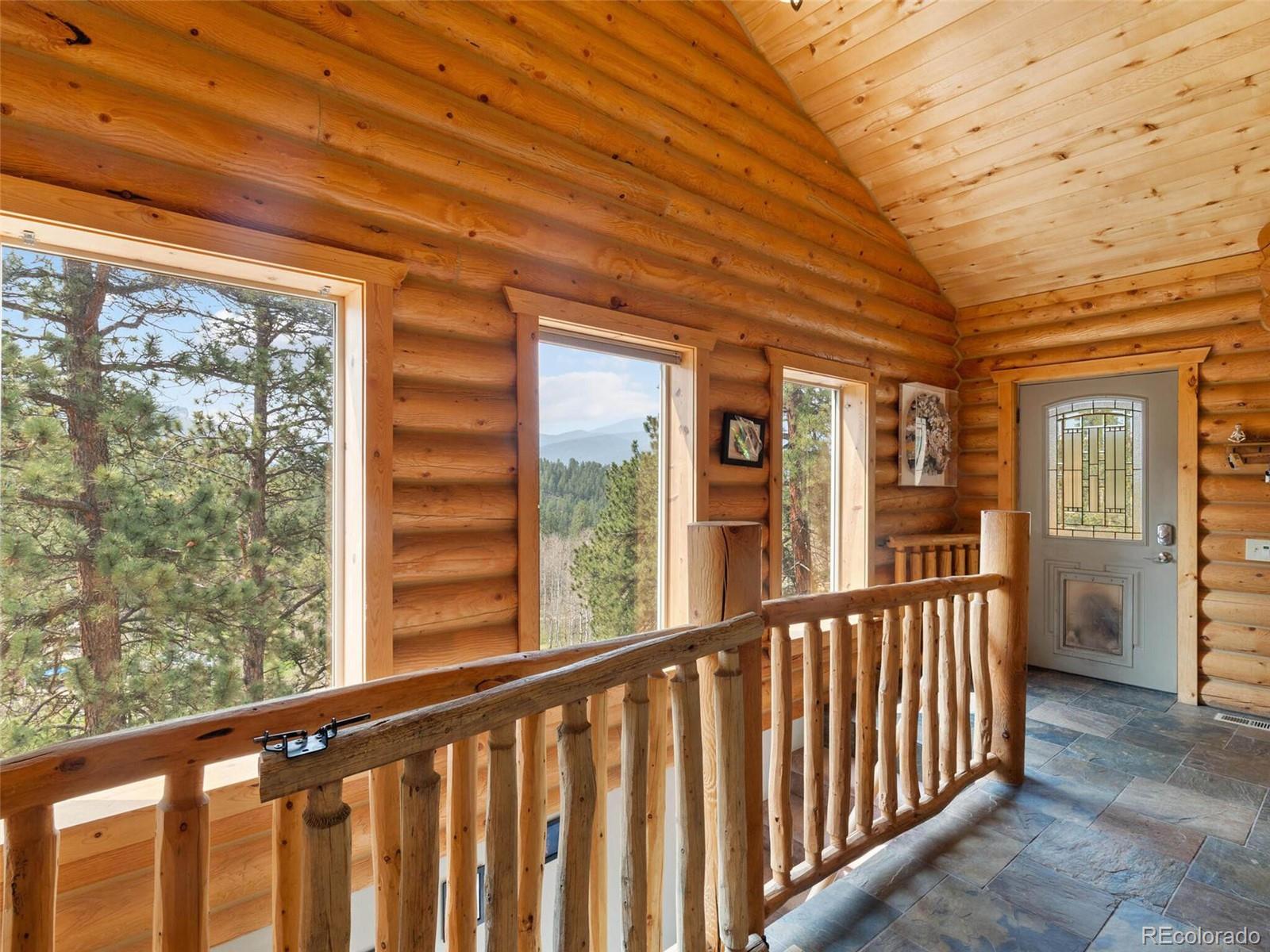 603 Old State Road Bailey, CO 80421 - Photo 8 of 40 a view of city from a balcony