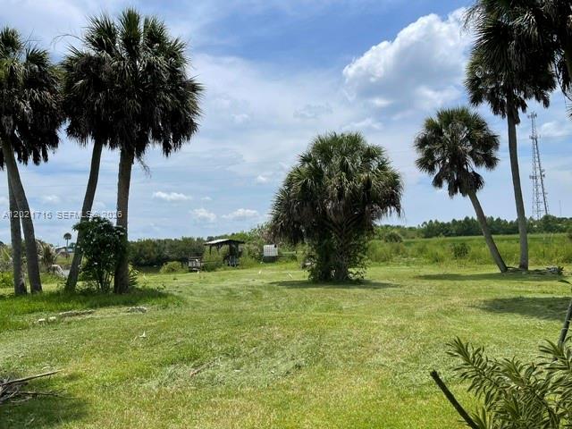 1326 Red Barn Rd N West Moore Haven, FL 33471 - Photo 1 of 13 a view of an outdoor space and swimming pool