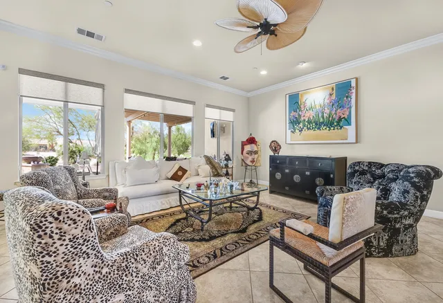 a kitchen with stainless steel appliances kitchen island granite countertop a stove a sink and a microwave