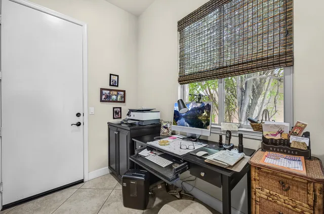 a view of swimming pool with chairs
