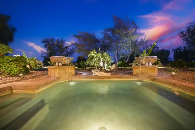 an outdoor space with lots of green space