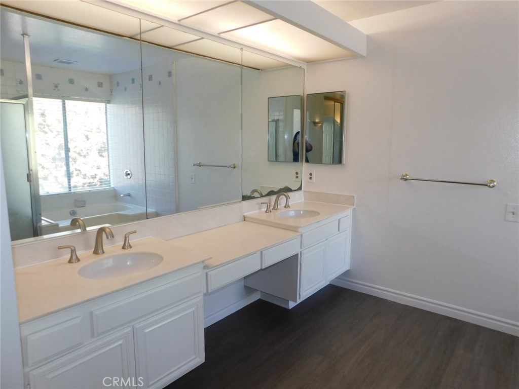 22411 Salmeron Mission Viejo, CA 92691 - Photo 22 of 30 a bathroom with a sink double vanity and a mirror