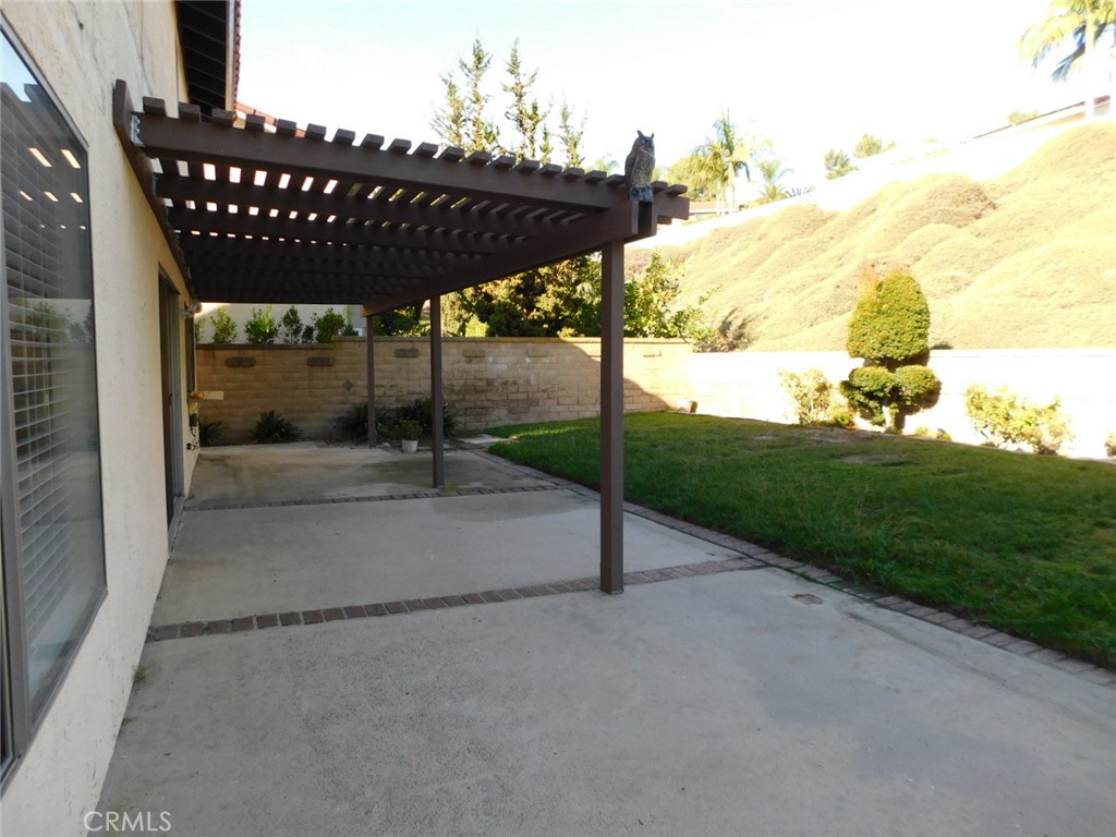 22411 Salmeron Mission Viejo, CA 92691 - Photo 29 of 30 a backyard of a house with table and chairs