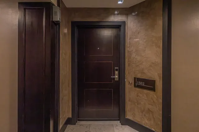 a view of hallway with livingroom