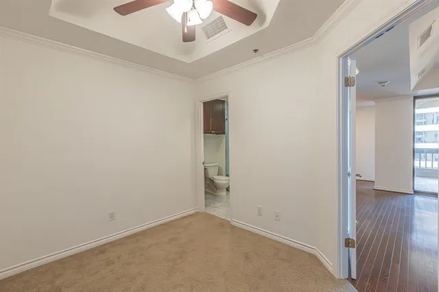 a bathroom with a sink double vanity granite tub shower and a mirror
