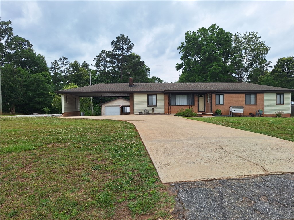 610 Dr Mitchell Road Seneca, SC 29678 - Photo 2 of 47 A classic ranch-style residence featuring a long driveway.