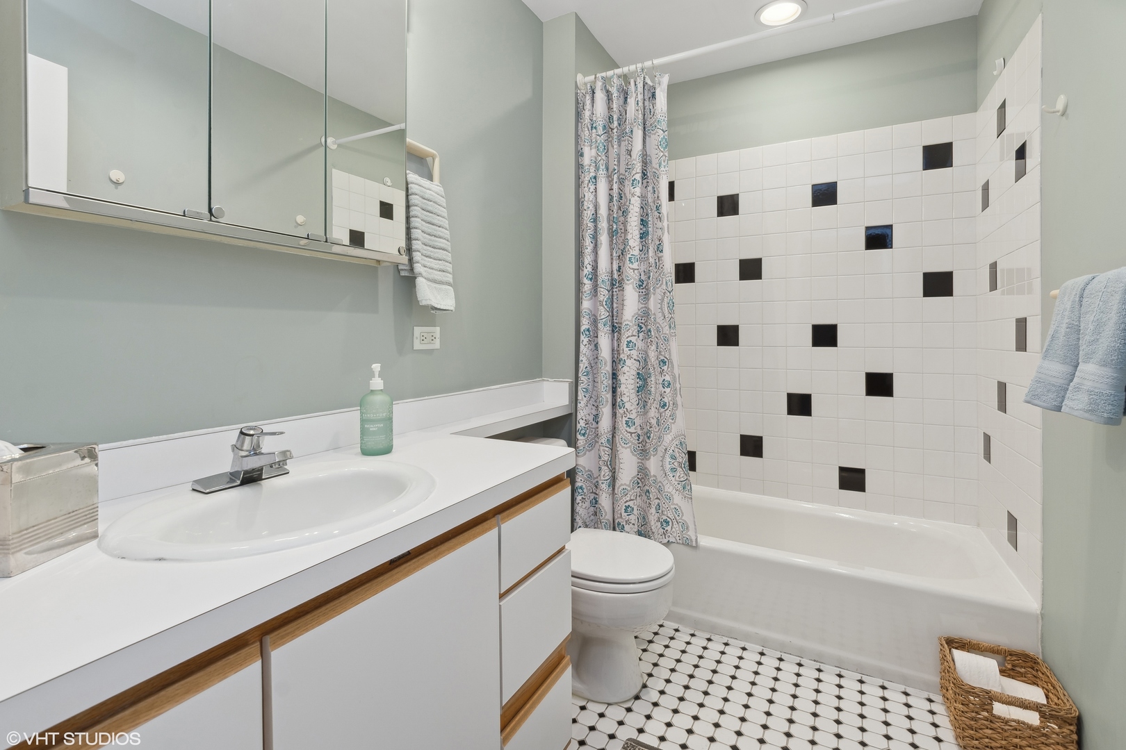 312 North May Street, Unit 2F Chicago, IL 60607 - Photo 11 of 15 a bathroom with a sink a toilet and shower