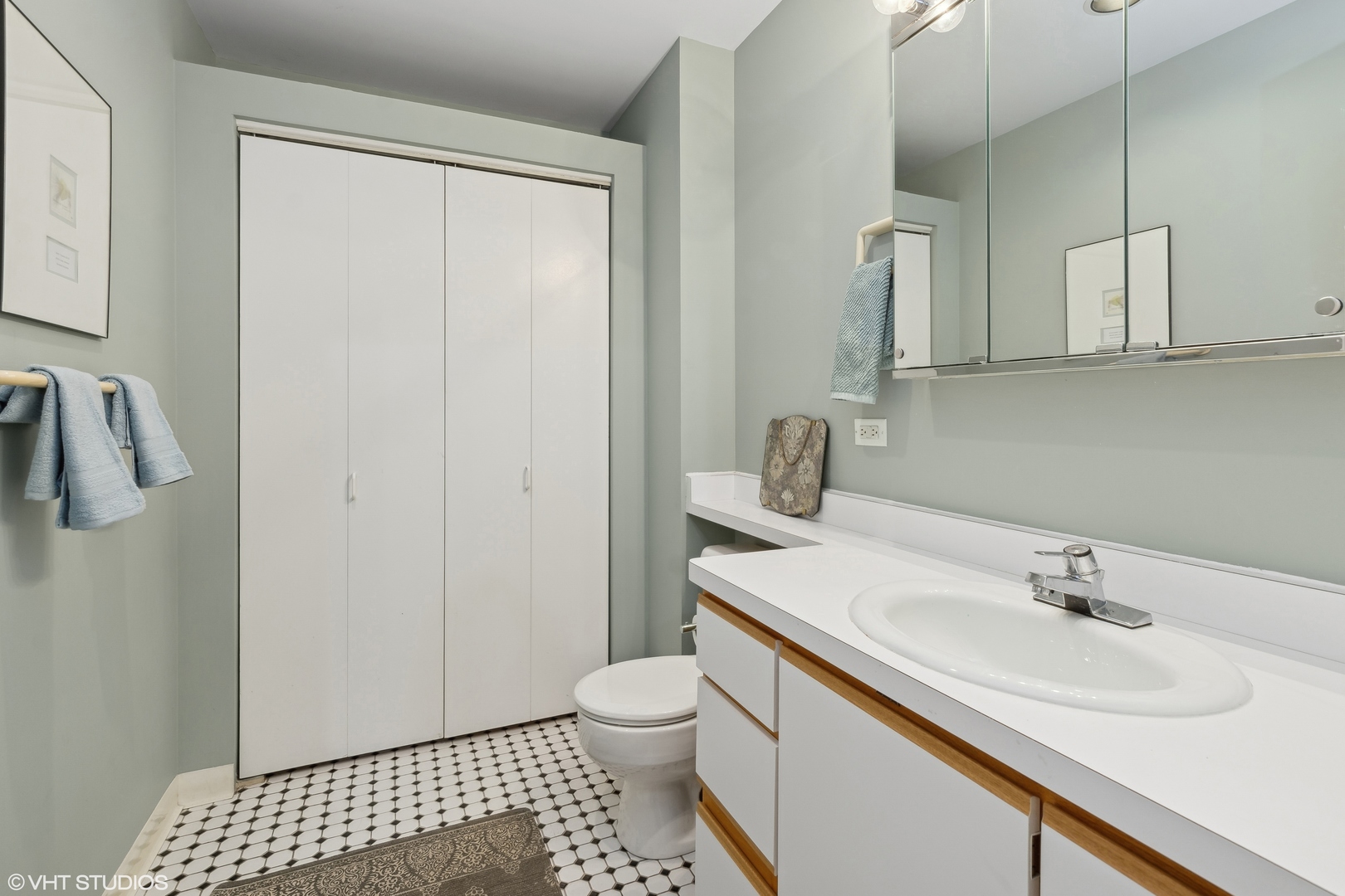 312 North May Street, Unit 2F Chicago, IL 60607 - Photo 12 of 15 a bathroom with a sink toilet and shower