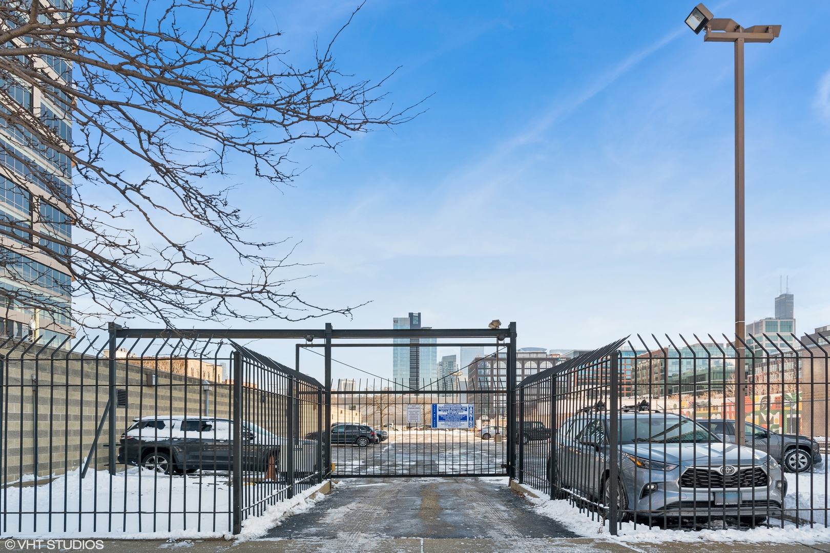 312 North May Street, Unit 2F Chicago, IL 60607 - Photo 15 of 15 a view of a swimming pool with a car park