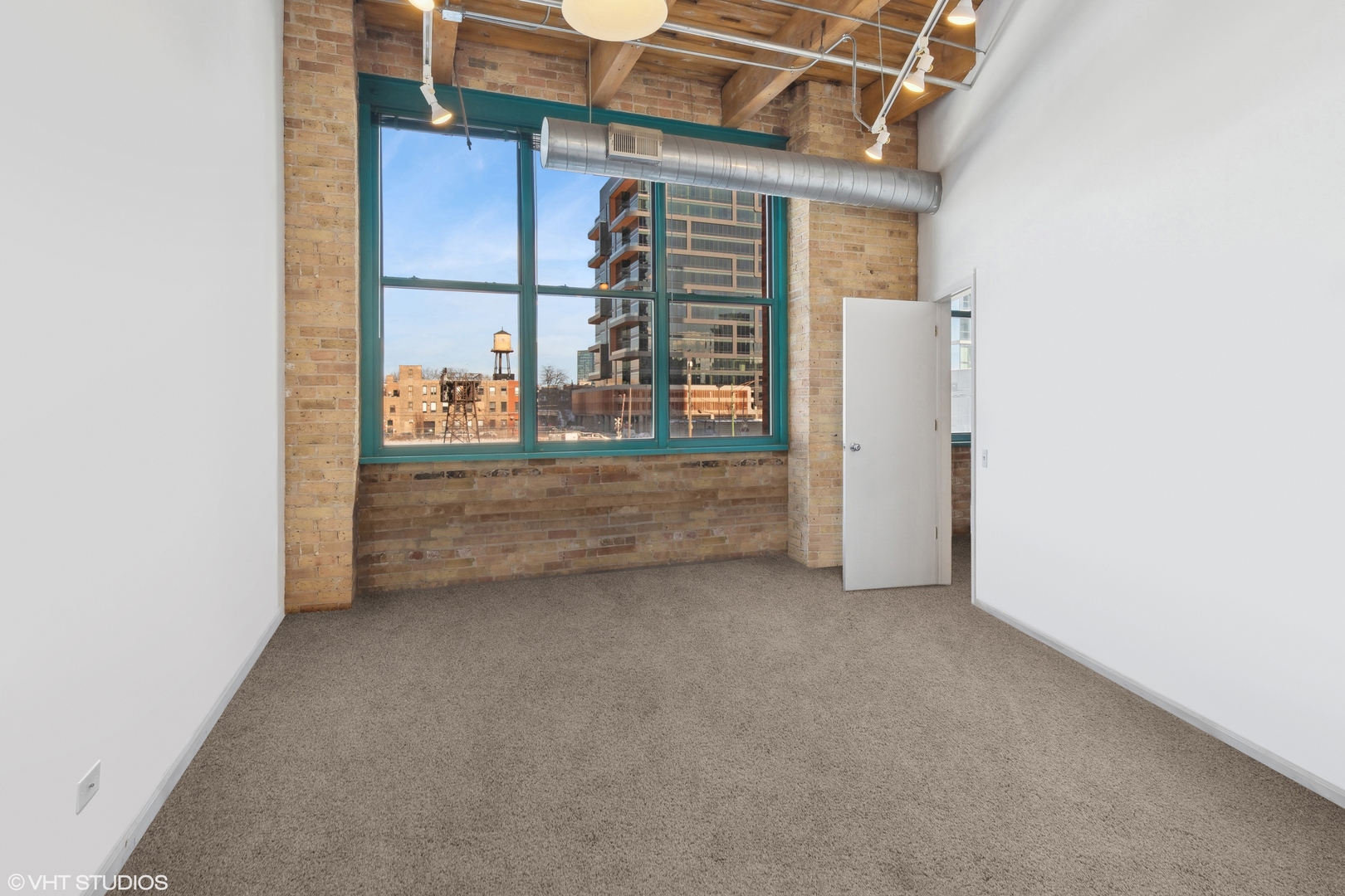 312 North May Street, Unit 2F Chicago, IL 60607 - Photo 10 of 15 a view of livingroom with an empty room