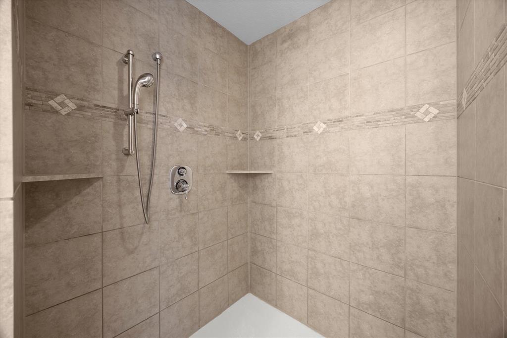 528 Hubbard Circle Nevada, TX 75173 - Photo 20 of 38 a bathroom with a shower