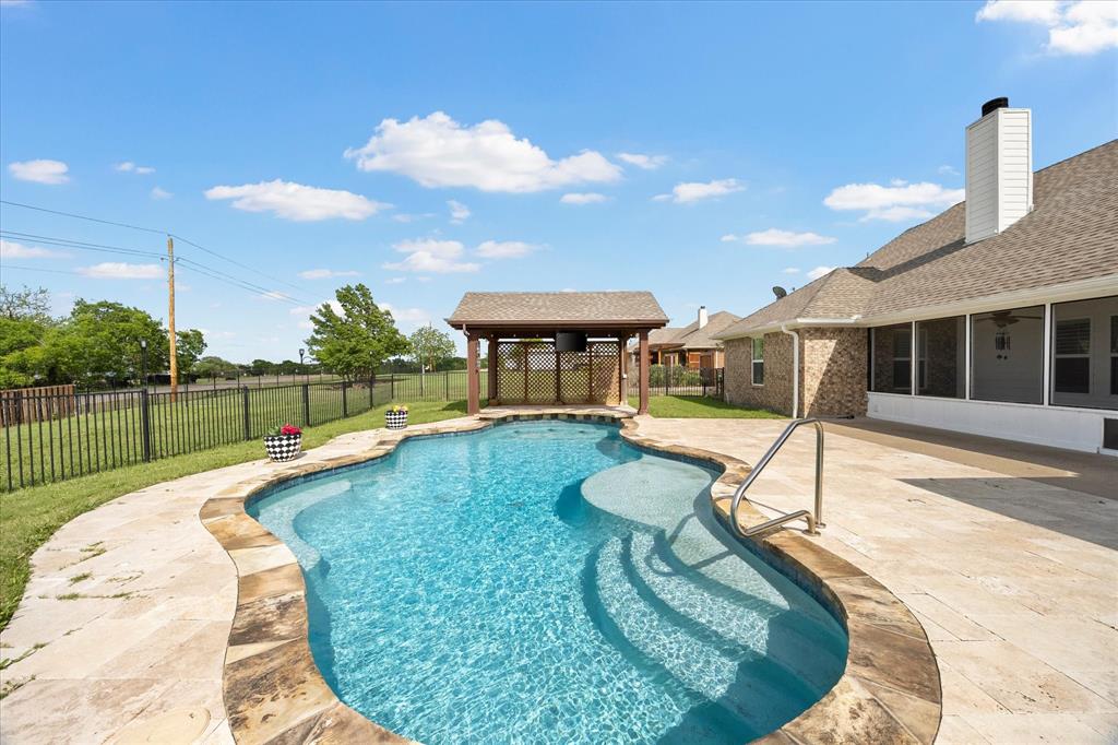 528 Hubbard Circle Nevada, TX 75173 - Photo 28 of 38 a view of a house with swimming pool and a yard