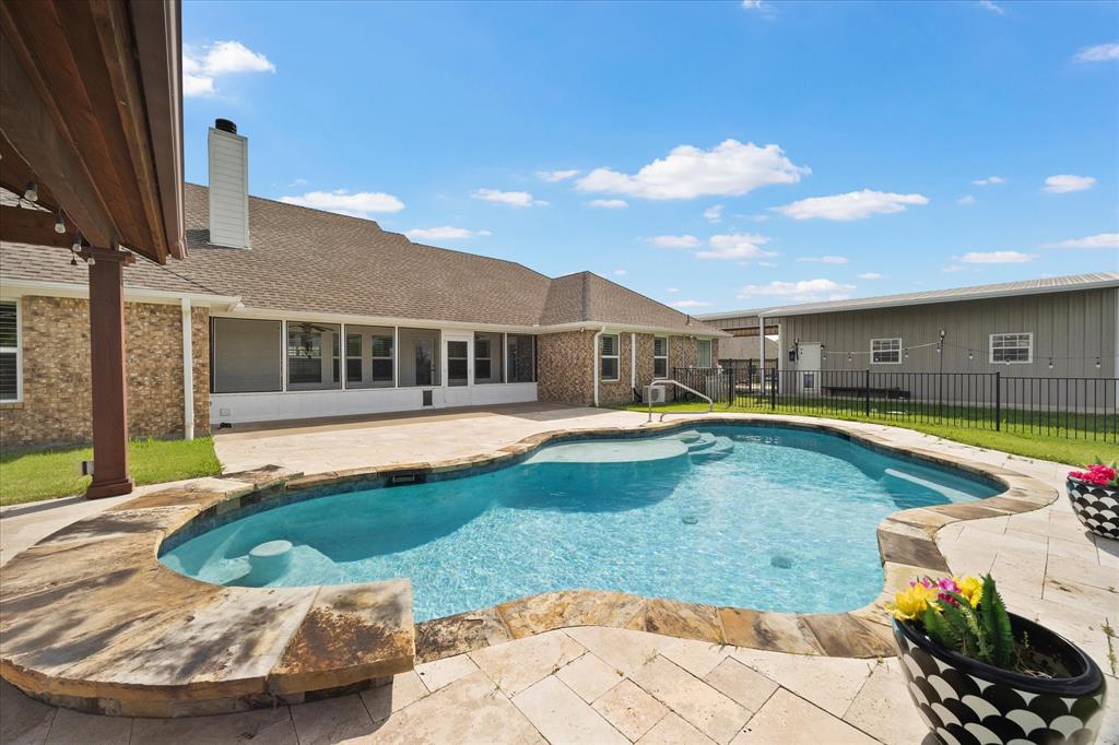 528 Hubbard Circle Nevada, TX 75173 - Photo 29 of 38 a view of a house with swimming pool and sitting area