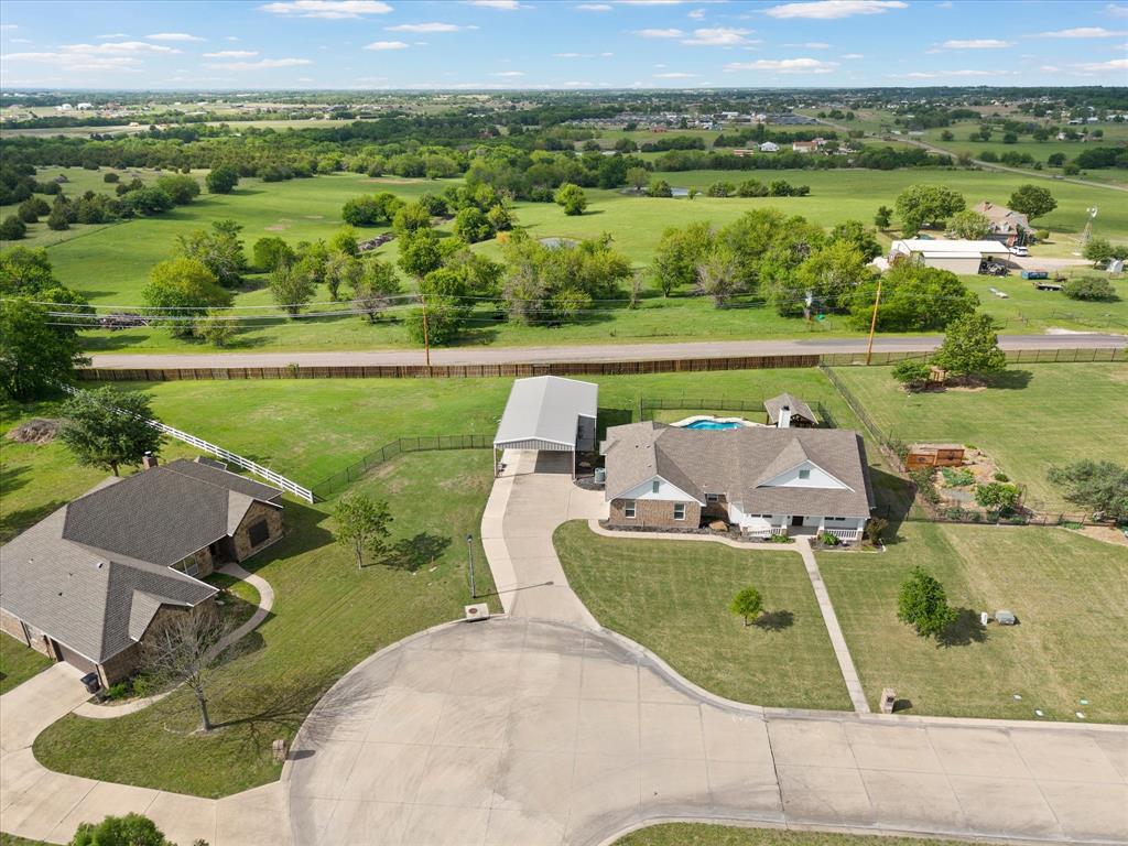 528 Hubbard Circle Nevada, TX 75173 - Photo 37 of 38 an aerial view of a house with a garden and lake view