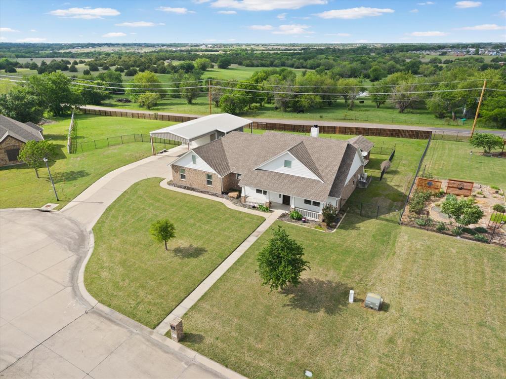 528 Hubbard Circle Nevada, TX 75173 - Photo 38 of 38 an aerial view of a house with a big yard
