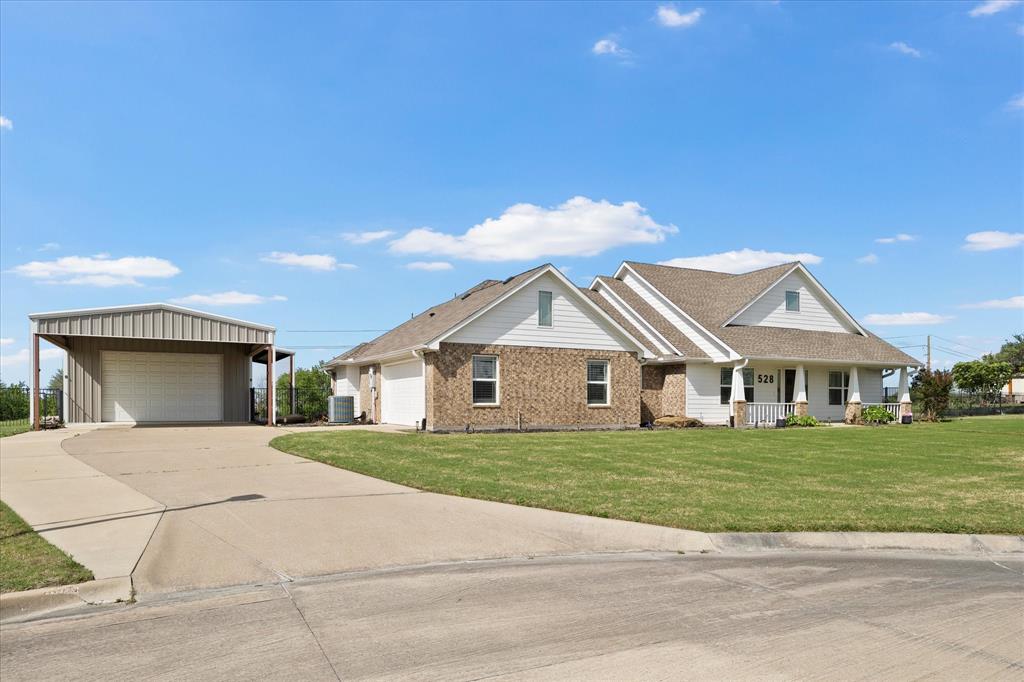 528 Hubbard Circle Nevada, TX 75173 - Photo 5 of 38 a house with a outdoor space