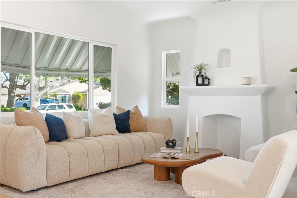 829 North Valley Street Burbank, CA 91505 - Photo 11 of 58 a living room with furniture and a fireplace