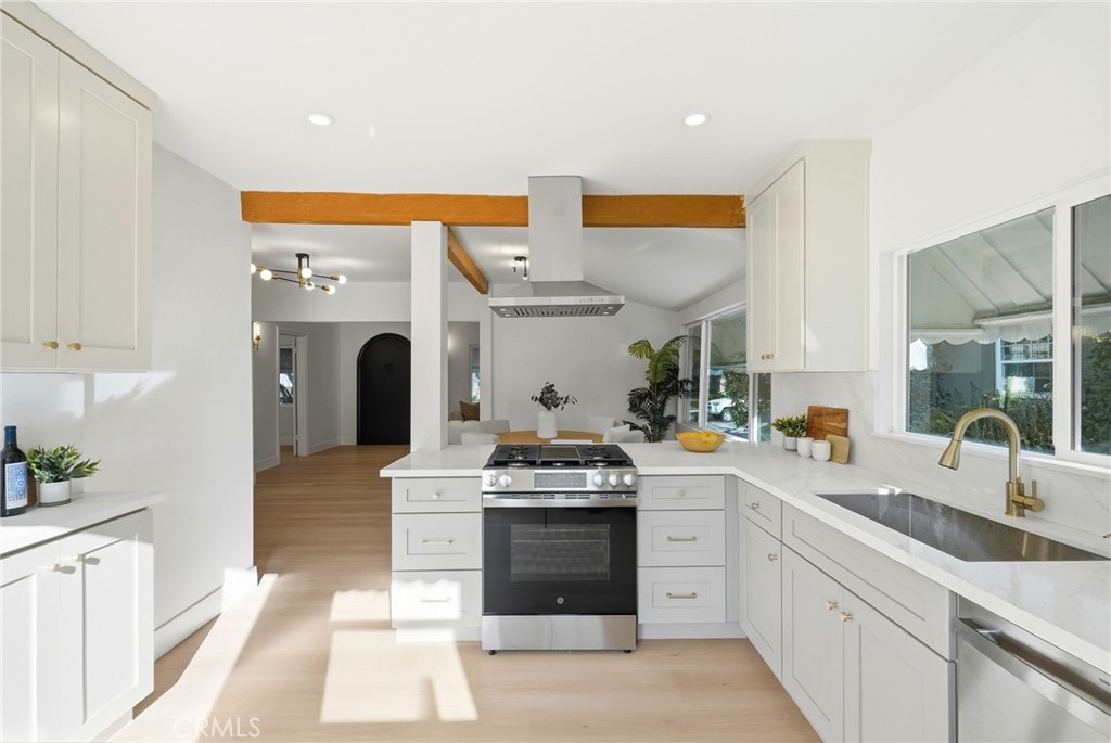 829 North Valley Street Burbank, CA 91505 - Photo 21 of 58 a kitchen with stainless steel appliances granite countertop a stove and a sink